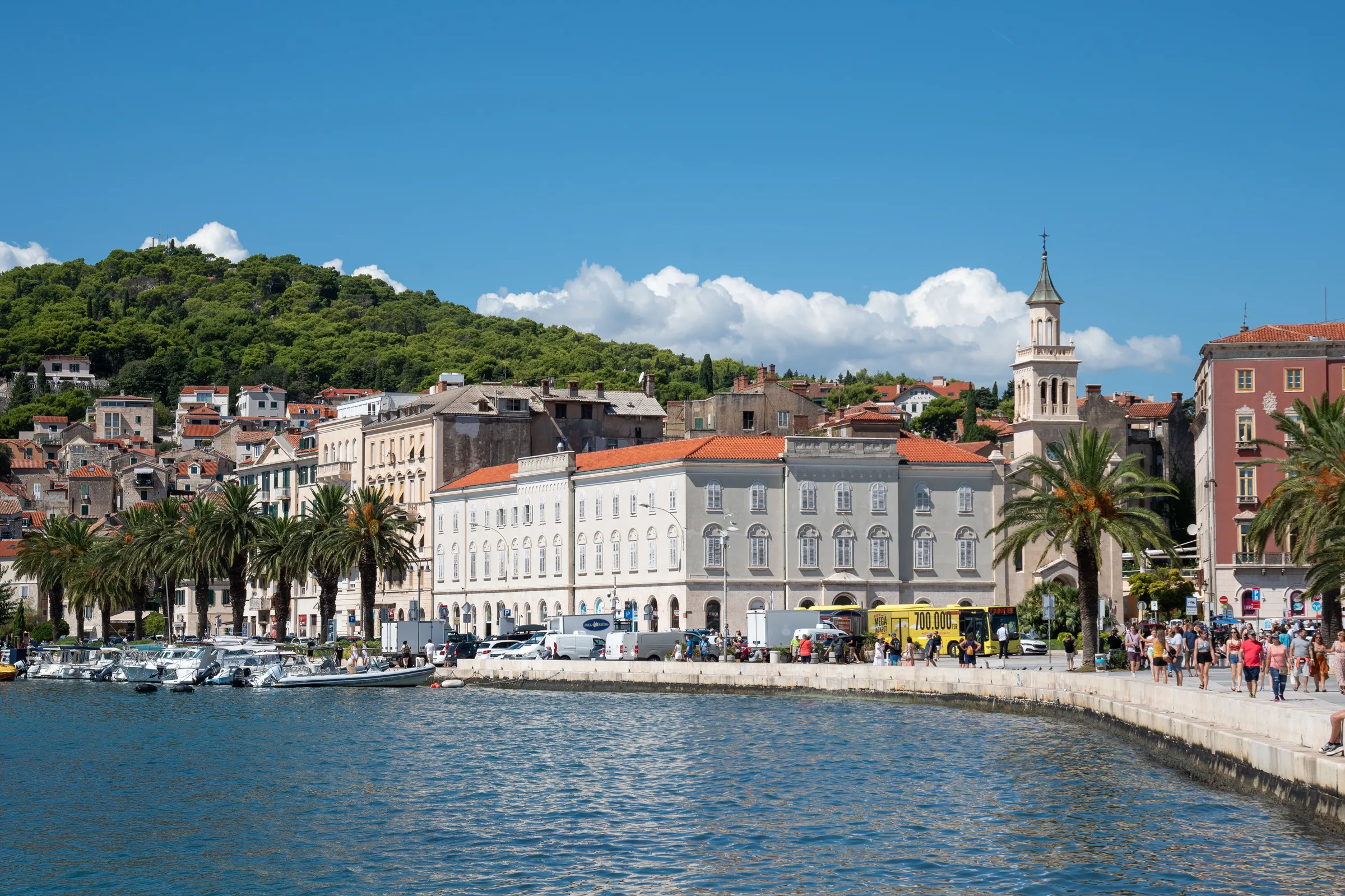Split waterfront buildings beside the sea